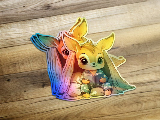Adorable Animal Reading Under Blanket Sticker product