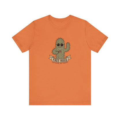 Orange t-shirt with cartoon cactus wearing sunglasses, holding coffee.