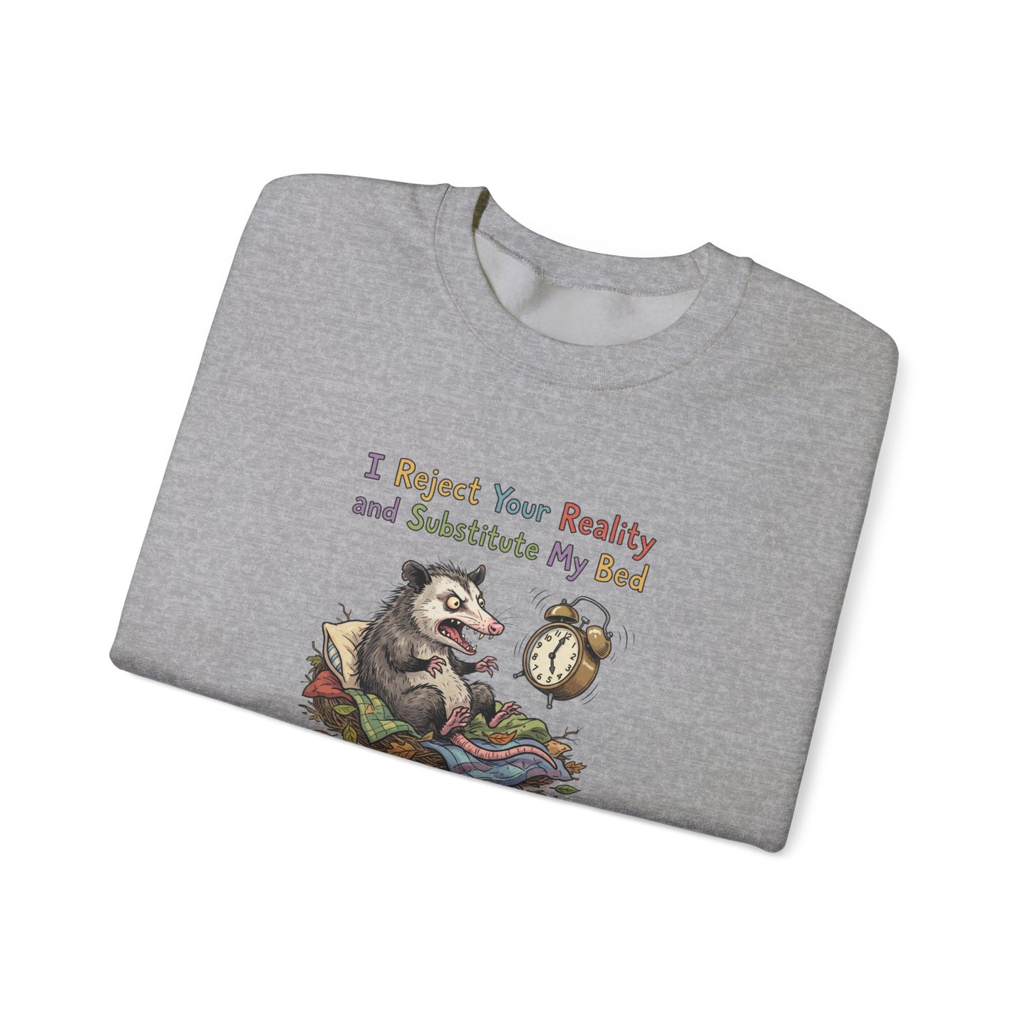 Gray sweatshirt with possum illustration and text "I Reject Your Reality and Substitute My Bed".
