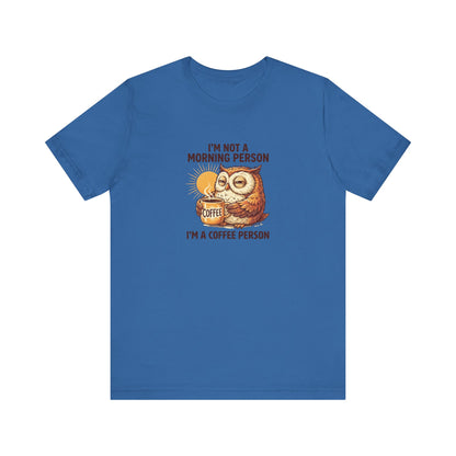 Owl with coffee cup and sun on blue t-shirt reads "I'M NOT A MORNING PERSON I'M A COFFEE PERSON".