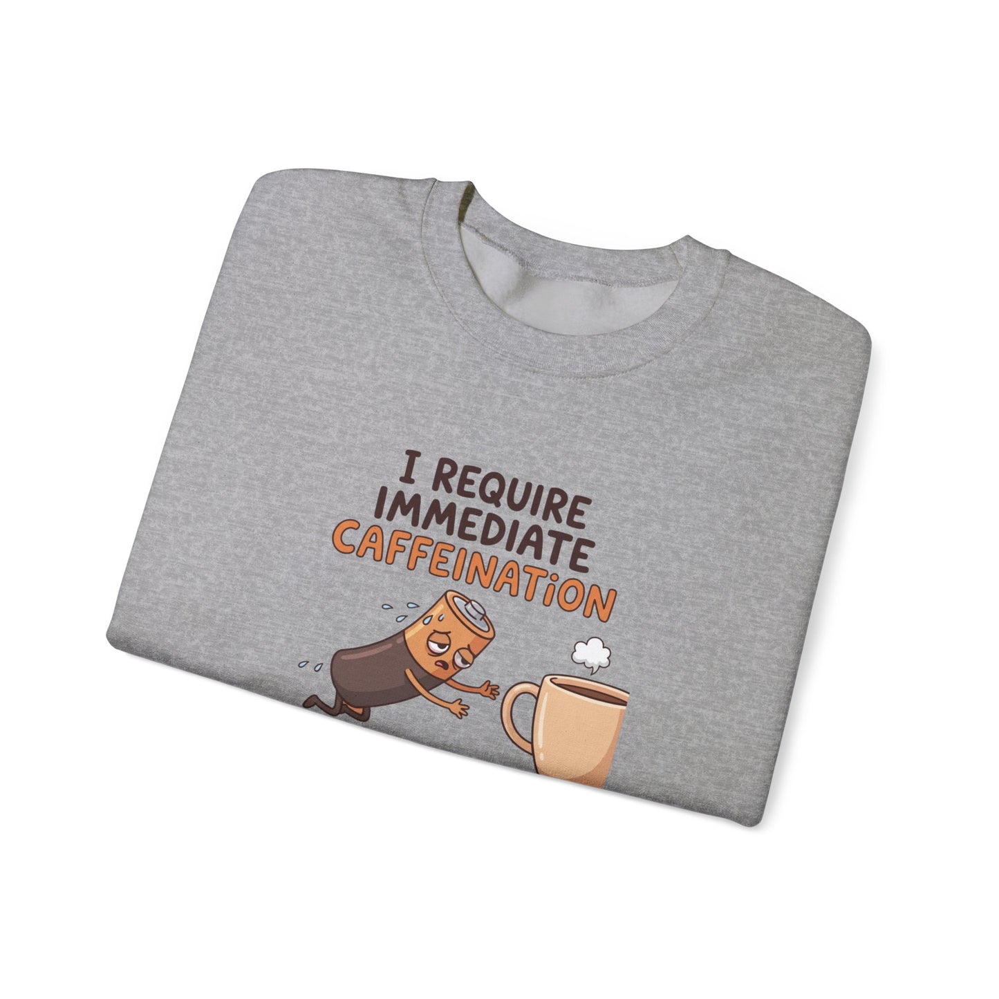Gray sweatshirt with "I REQUIRE IMMEDIATE CAFFEINATION" and a battery falling into a coffee cup.