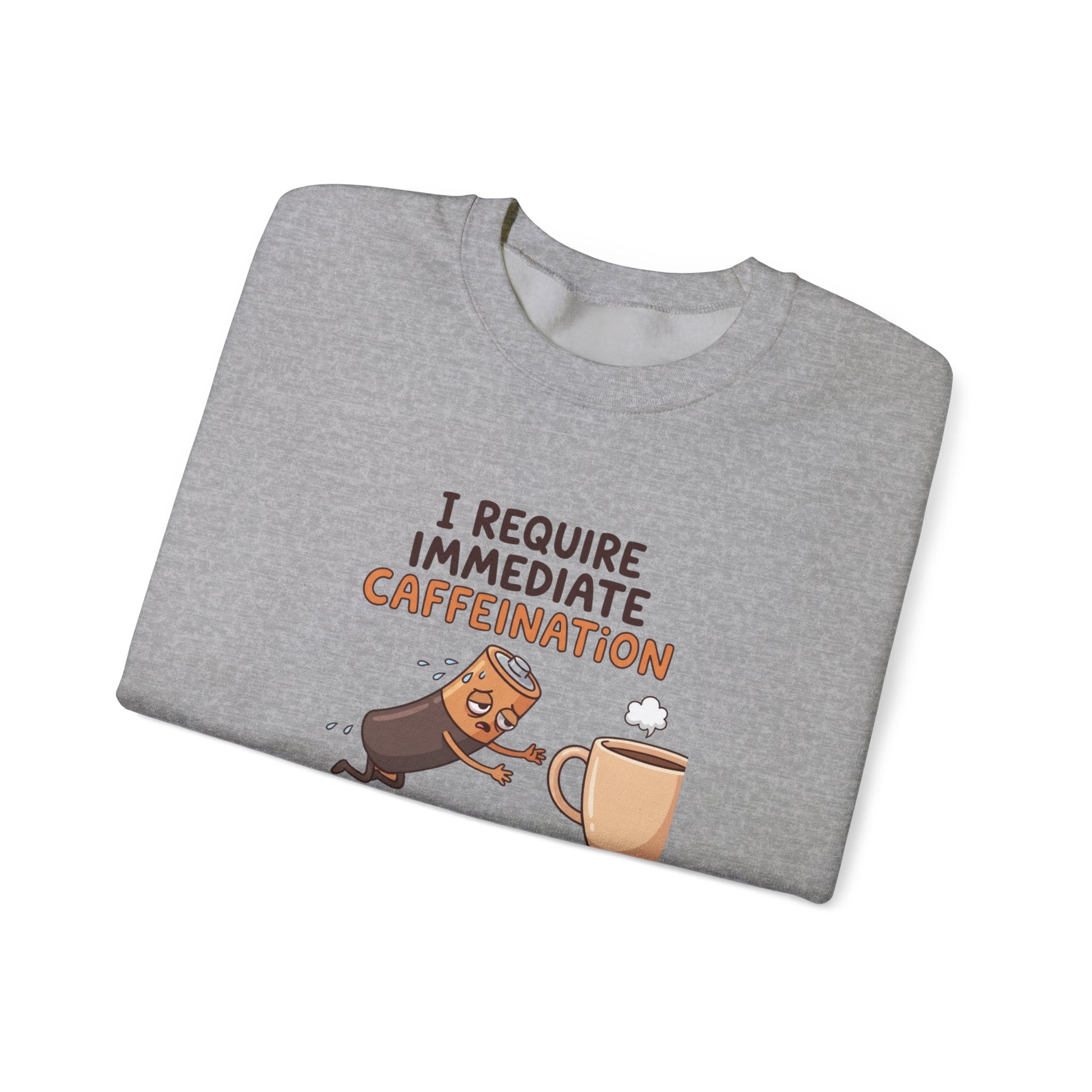 Gray sweatshirt with "I REQUIRE IMMEDIATE CAFFEINATION" and a battery falling into a coffee cup.