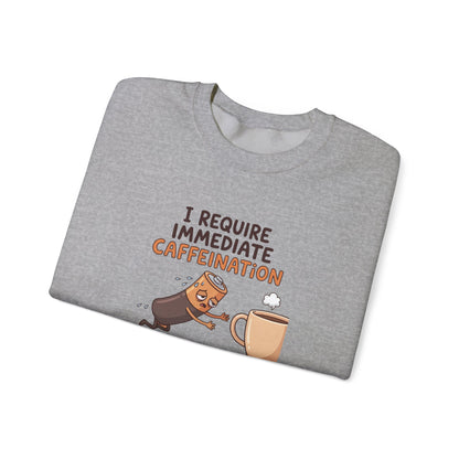 Gray sweatshirt with "I REQUIRE IMMEDIATE CAFFEINATION" and a battery falling into a coffee cup.