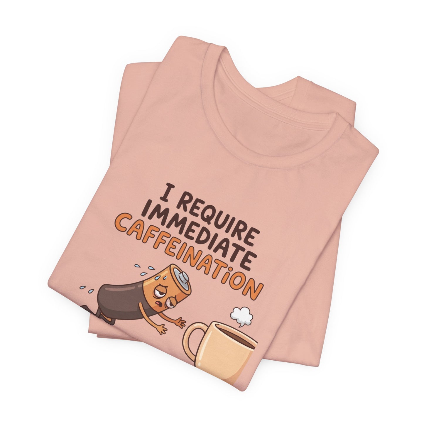 T-shirt with text "I require caffeination" above a sad battery reaching for coffee.