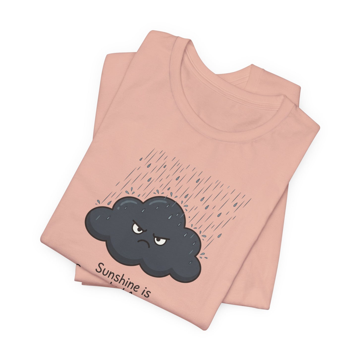 Pink t-shirt with a grumpy rain cloud and text "Sunshine is".