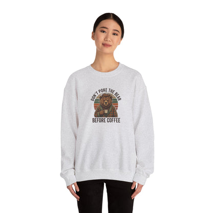 Light gray crewneck sweatshirt with a bear drinking coffee graphic and text.