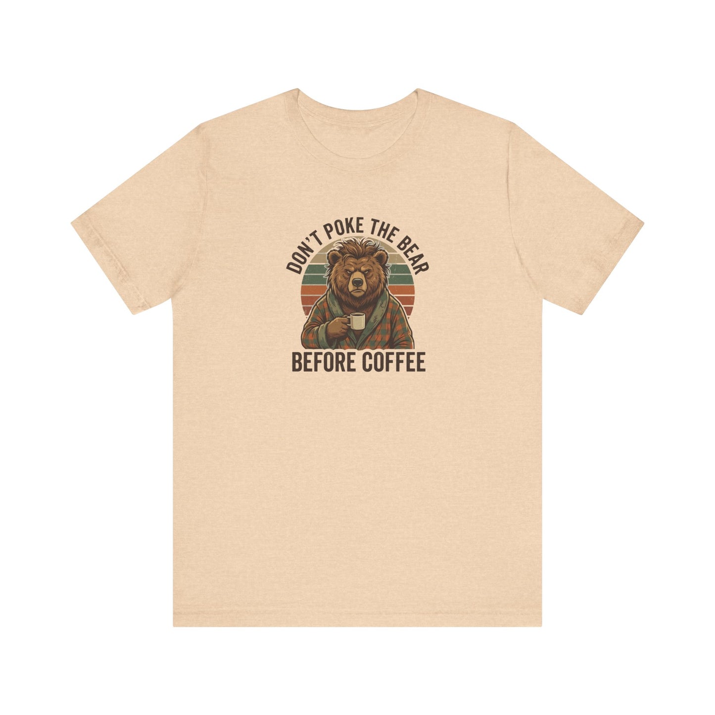 T-shirt with a bear wearing pajamas holding a coffee mug, text reads "Don't poke the bear before coffee."
