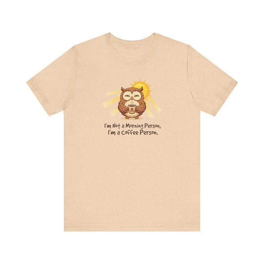 T-shirt with a sun and coffee cup graphic, reading "I'm Not a Morning Person, I'm a Coffee Person."