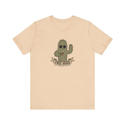 T-shirt graphic of a cactus wearing sunglasses and holding a sign that says "FREE HUGS".