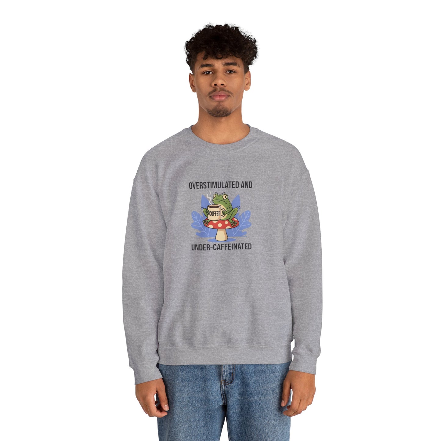 Gray sweatshirt with frog on mushroom, "Overstimulated and Under-Caffeinated" text.