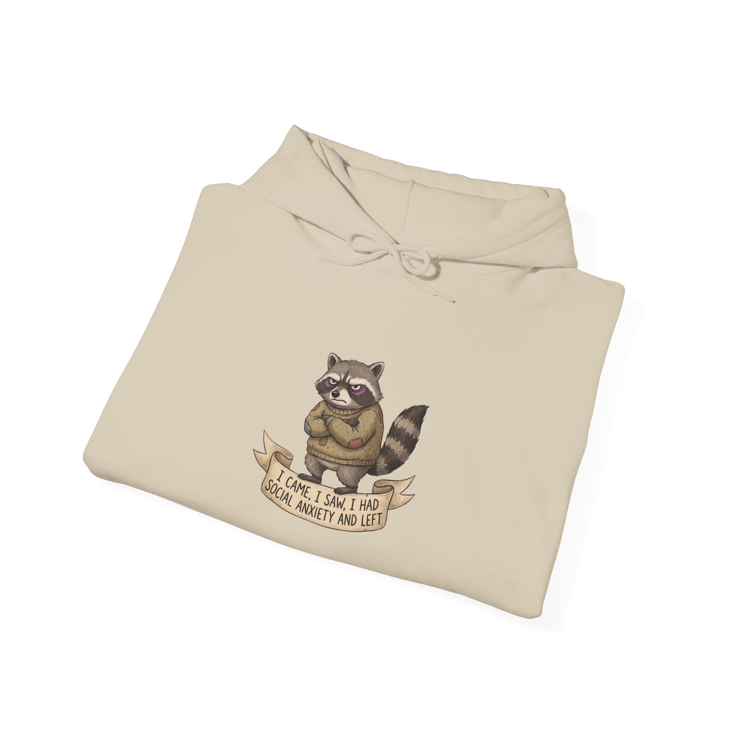 Tan hoodie with a raccoon wearing a banner that reads "I came, I saw, I had social anxiety and left."