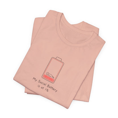 Pink t-shirt with a low battery icon and text "My Social Battery is at 1%".