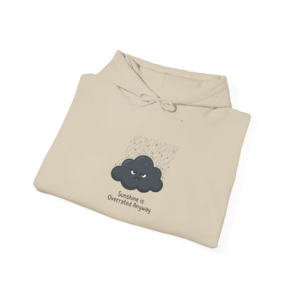 Beige hoodie with a grumpy cloud graphic and text "Sunshine is Overrated Anyway".