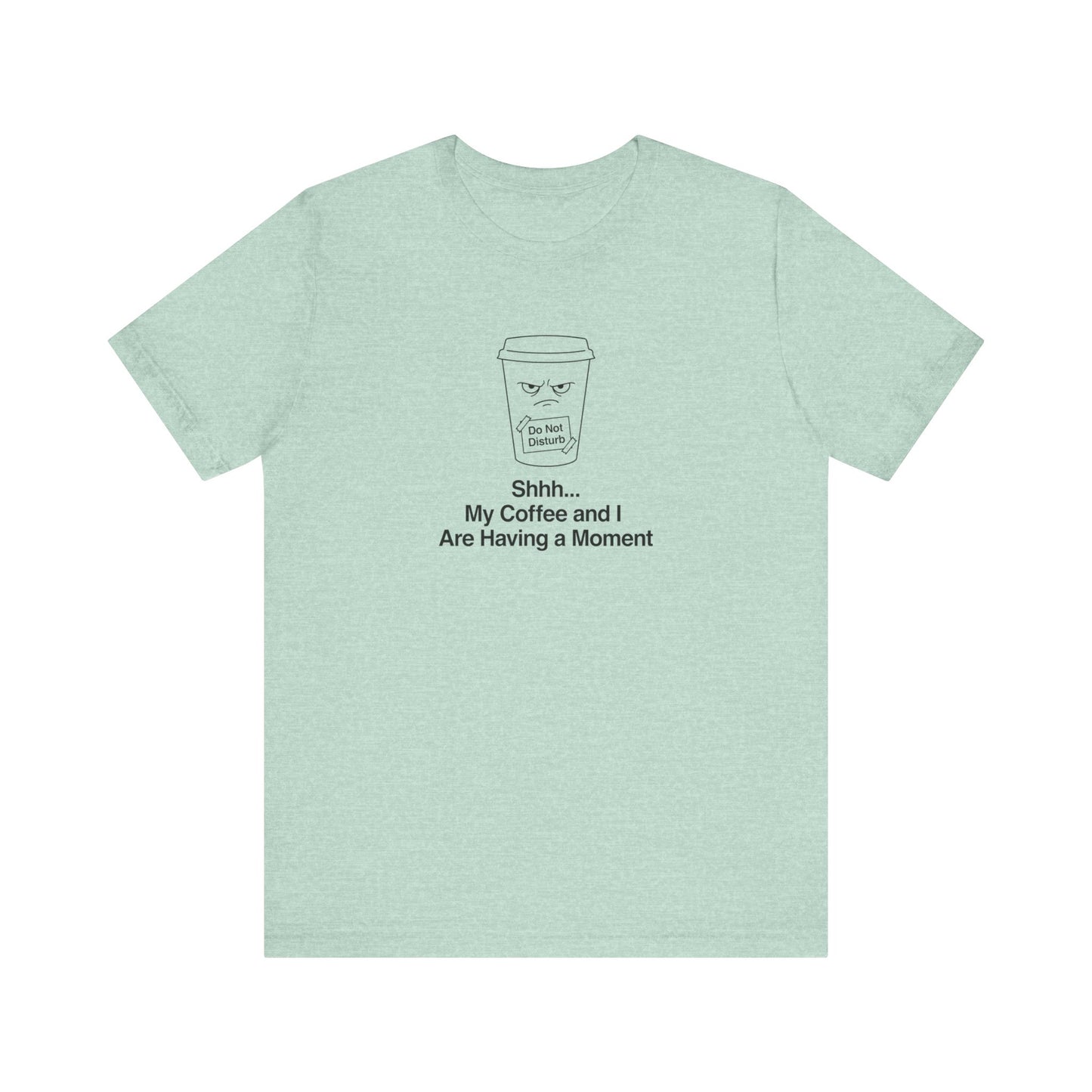 Light teal t-shirt with black line drawing of coffee cup and text "Shhh... My Coffee and I Are Having a Moment."