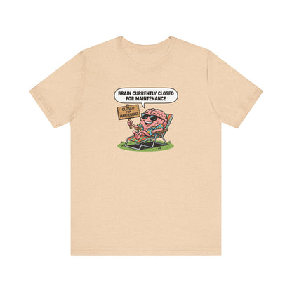 T-shirt with a cartoon brain relaxing on a beach chair, text reads "Brain currently closed for maintenance".