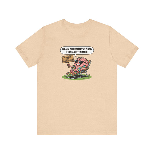 T-shirt with a cartoon brain relaxing on a beach chair, text reads "Brain currently closed for maintenance".