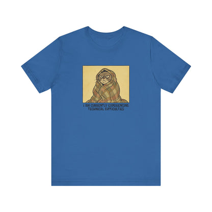 Blue t-shirt with cartoon cat wrapped in blanket, text "I AM CURRENTLY EXPERIENCING TECHNICAL DIFFICULTIES".