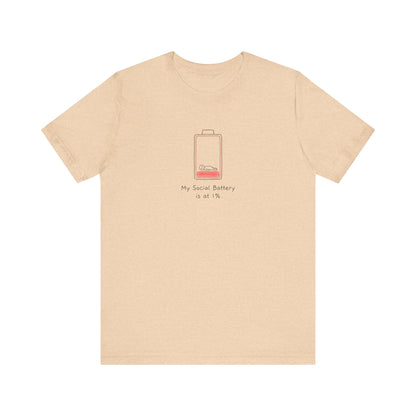 Peach t-shirt with a low battery graphic and text "My Social Battery is at 1%".
