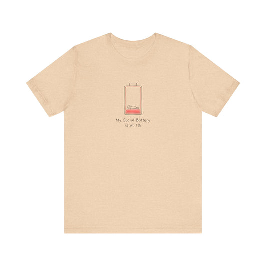 Peach t-shirt with a low battery graphic and text "My Social Battery is at 1%".