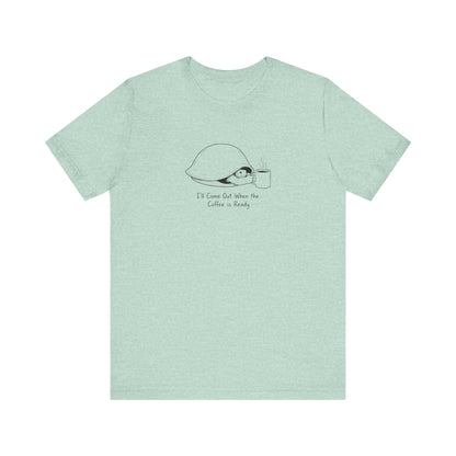 T-shirt with a drawing of a turtle in a helmet and a coffee cup, text reads "I'll Come Out When the Coffee is Ready".