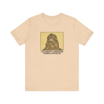 T-shirt with cartoon cat wrapped in blanket, text reads "I AM CURRENTLY EXPERIENCING TECHNICAL DIFFICULTIES".