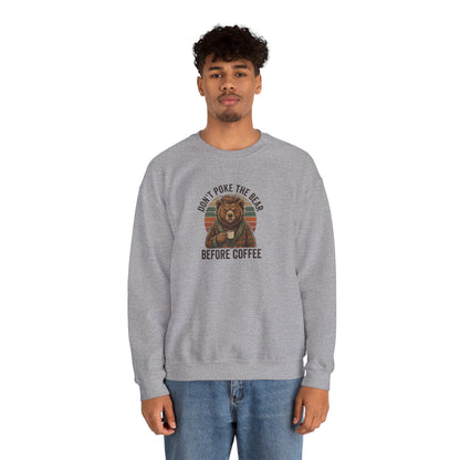 Gray sweatshirt with a bear holding a coffee mug and text "Don't poke the bear before coffee".