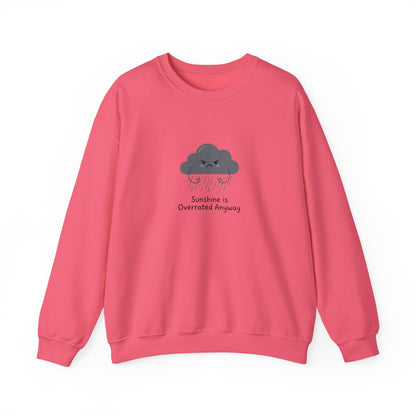 Pink sweatshirt with a frowning cloud graphic and text.
