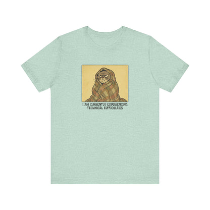 T-shirt graphic of a grumpy cat wrapped in a blanket with text "I AM CURRENTLY EXPERIENCING TECHNICAL DIFFICULTIES".