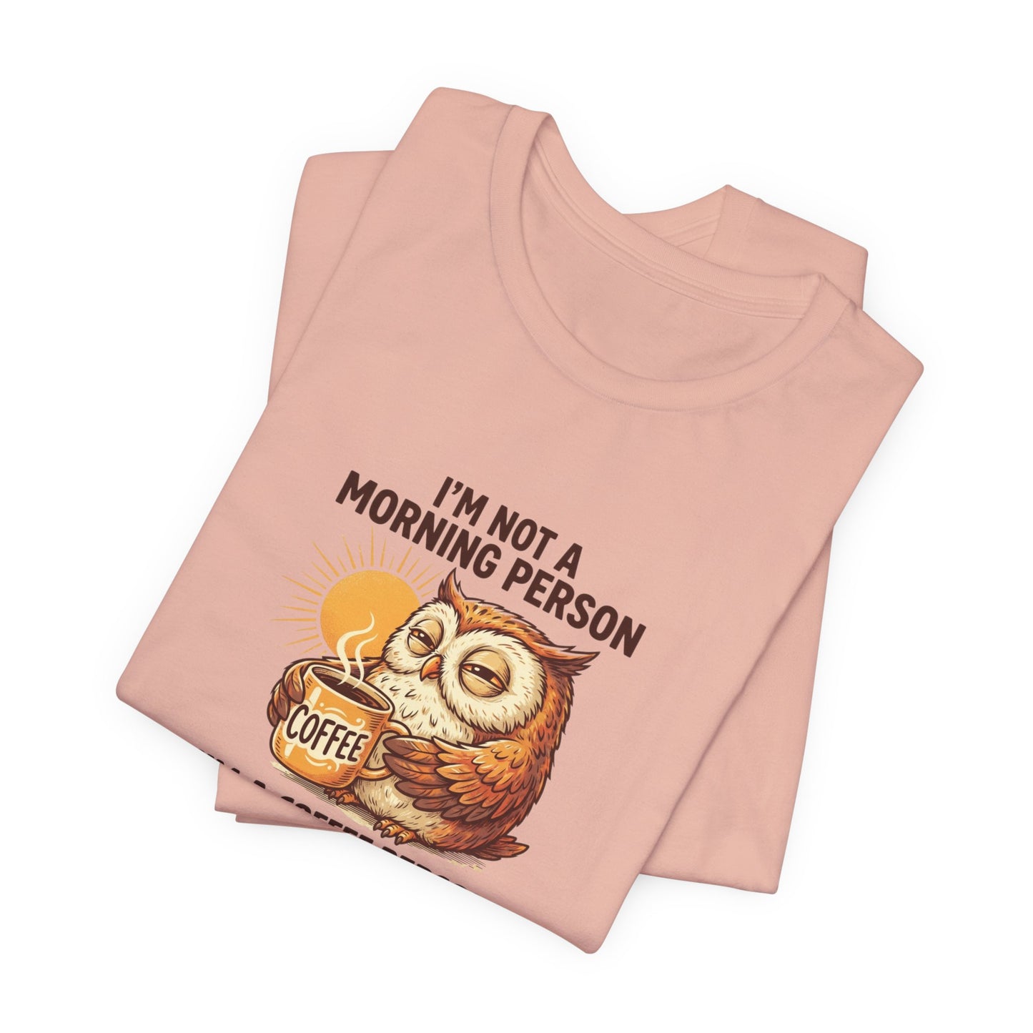 Peach t-shirt with owl holding coffee and "I'm not a morning person" text.