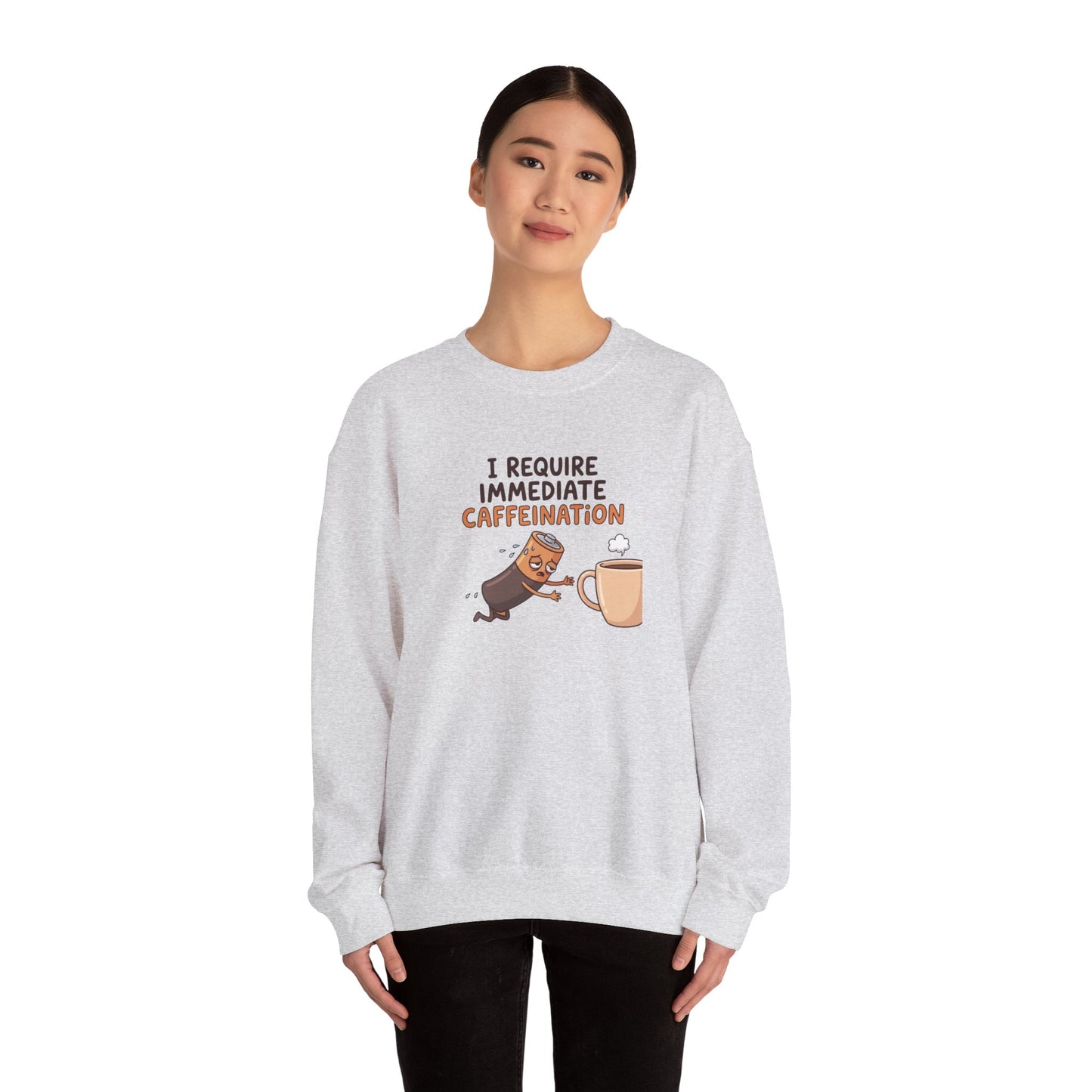Gray sweatshirt with cartoon cat reaching for coffee mug, text "I REQUIRE IMMEDIATE CAFFEINATION".