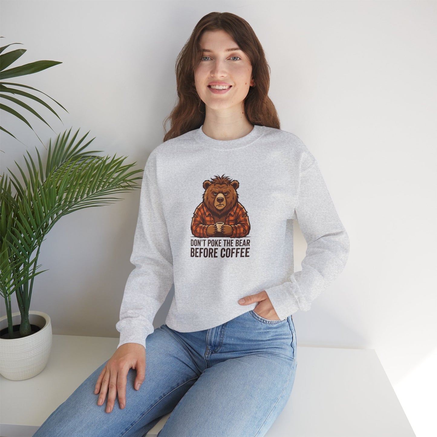 Light gray sweatshirt with a bear drinking coffee and text.