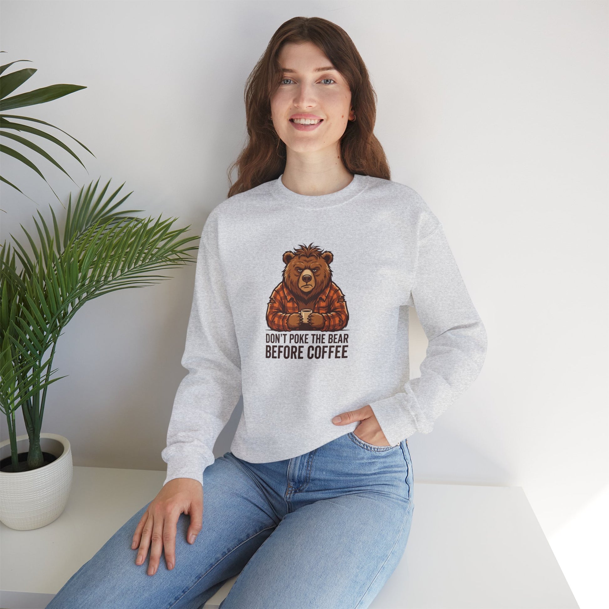 Light gray sweatshirt with a bear drinking coffee and text.