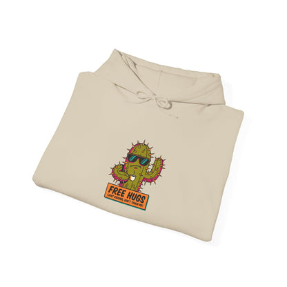 Beige hoodie with cartoon cactus graphic saying "FREE HUGS (Just kidding, don't touch me!)"