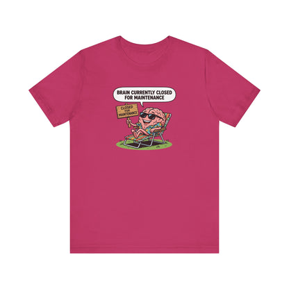 Cartoon brain wearing sunglasses relaxing on a lounge chair, "Brain Currently Closed for Maintenance" text.