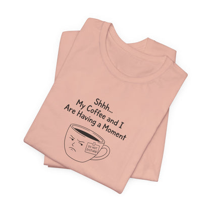 Peach t-shirt with "Shhh... My Coffee and I Are Having a Moment" text and a grumpy coffee cup.