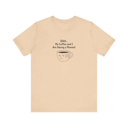 Peach t-shirt with a grumpy coffee cup and text "Shhh... My Coffee and I Are Having a Moment."