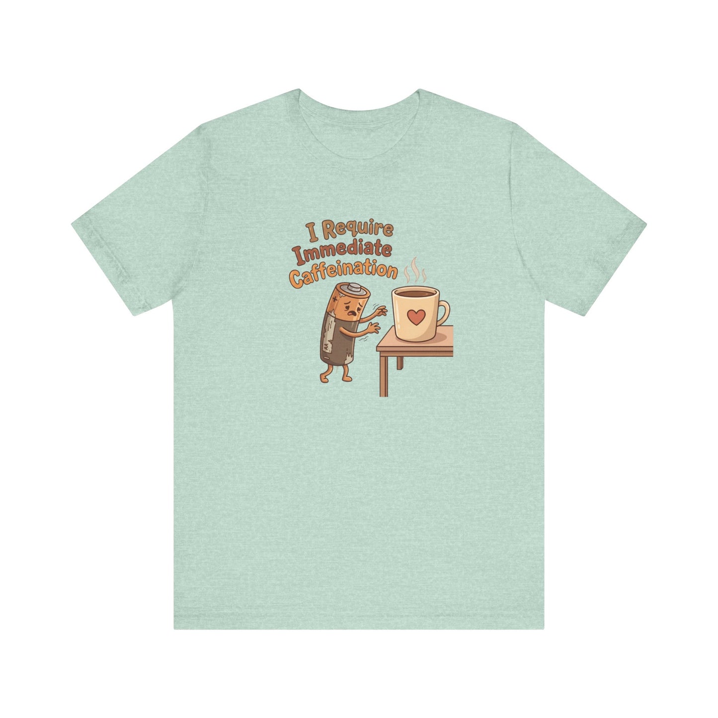 Cartoon coffee cup character on a mint green t-shirt with text "I Require Immediate Caffeination."