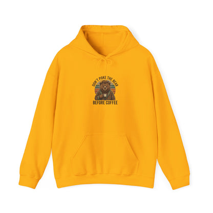 Yellow hoodie with bear holding coffee and "Don't Poke the Bear Before Coffee" text.