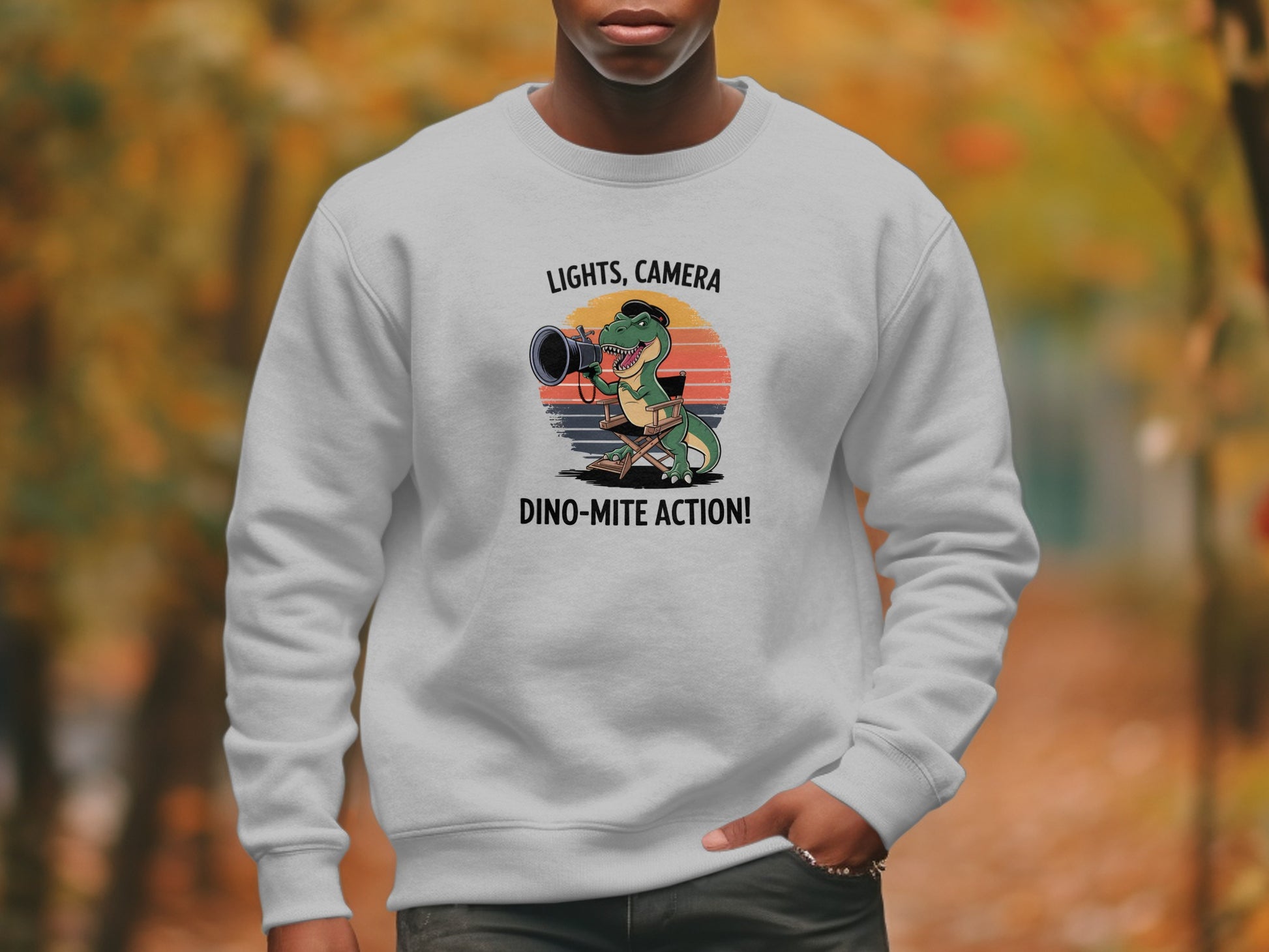 Lights Camera Dino-Mite Action Graphic Sweatshirt product