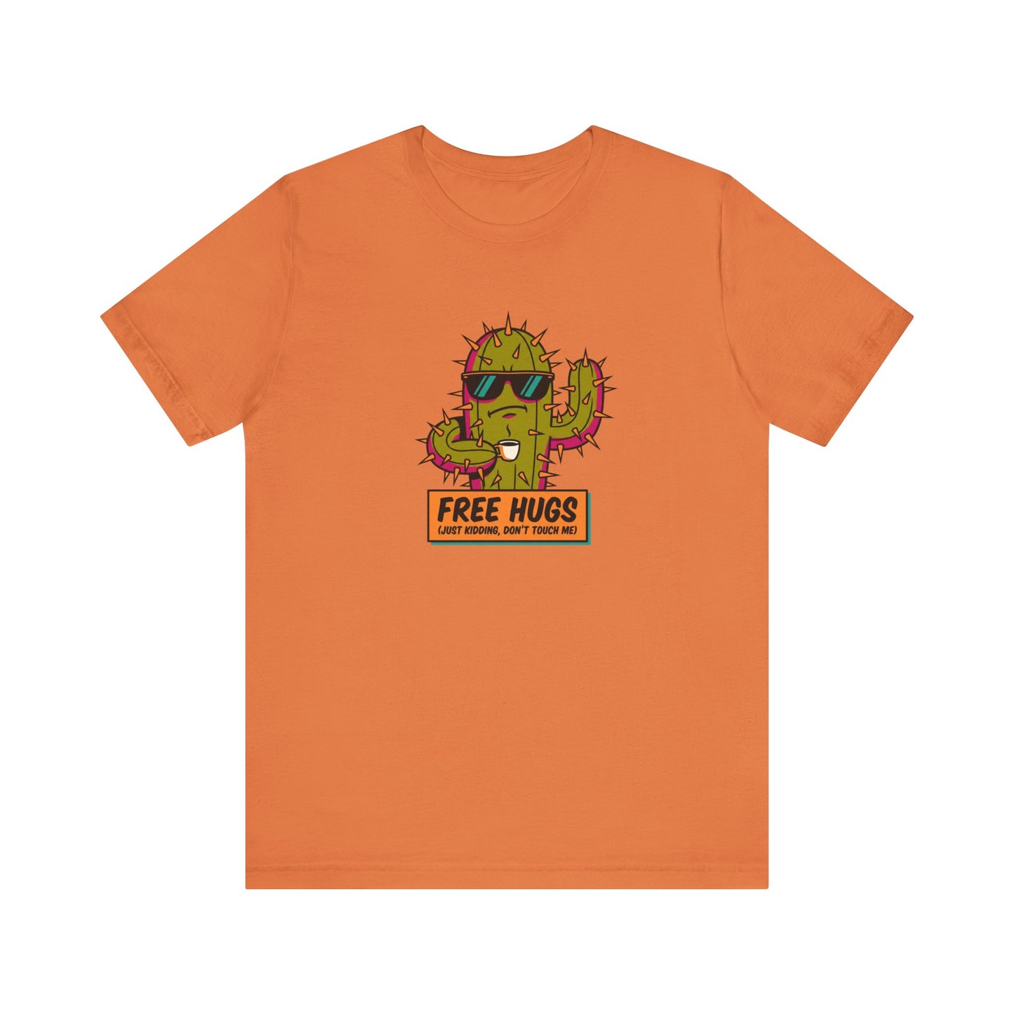 Orange t-shirt with cactus wearing sunglasses, holding a coffee mug, text "FREE HUGS (JUST KIDDING, DON'T TOUCH ME!)"
