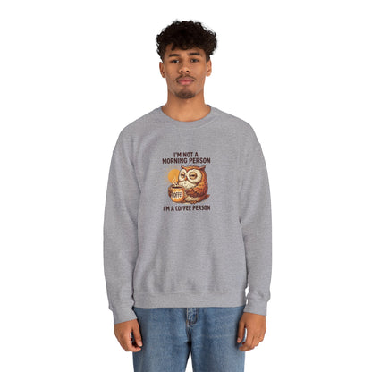 Grey sweatshirt with graphic of an owl holding a coffee cup and text "I'm Not A Morning Person. I'm A Coffee Person."