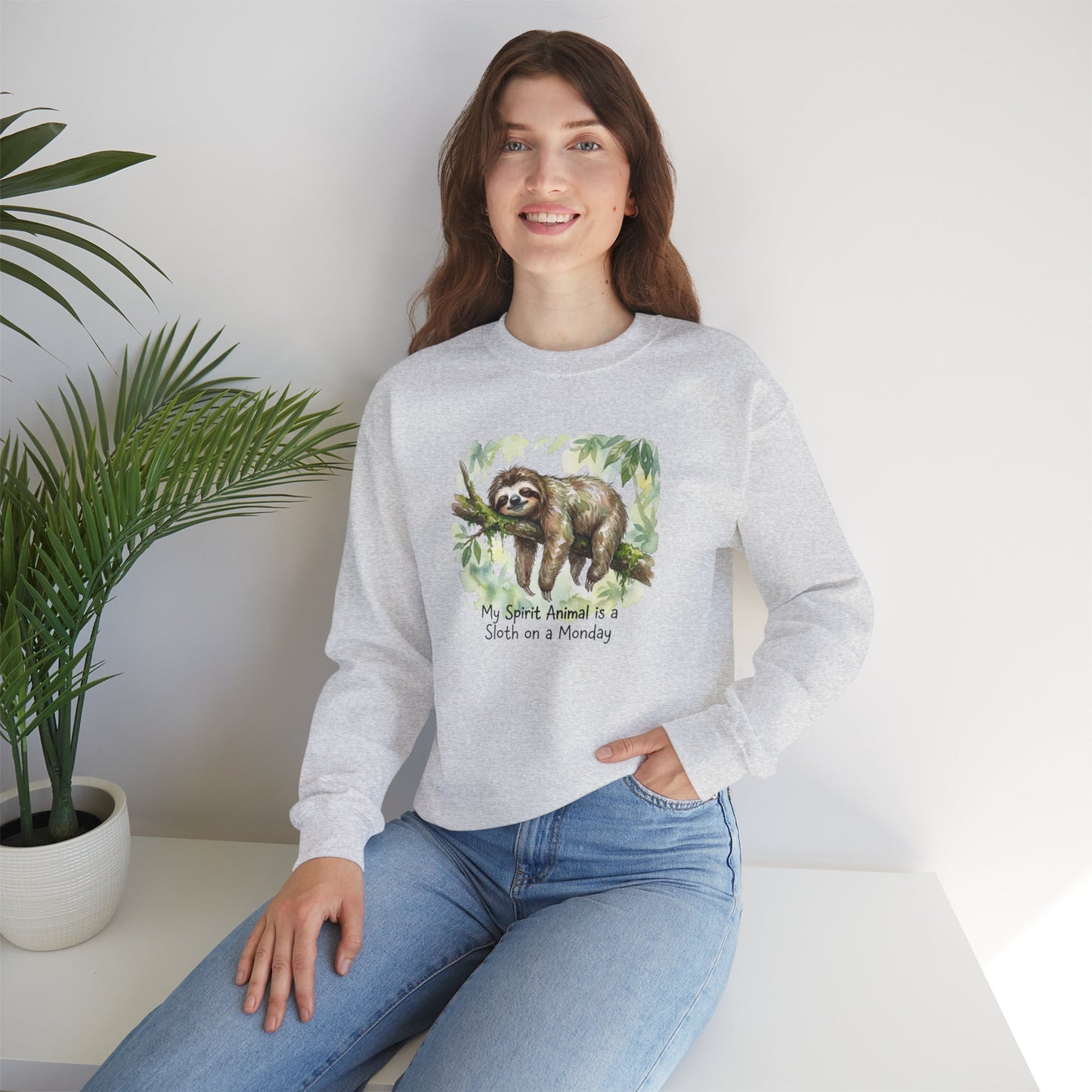 Gray sweatshirt with sloth and "My Spirit Animal is a Sloth on a Monday" text.