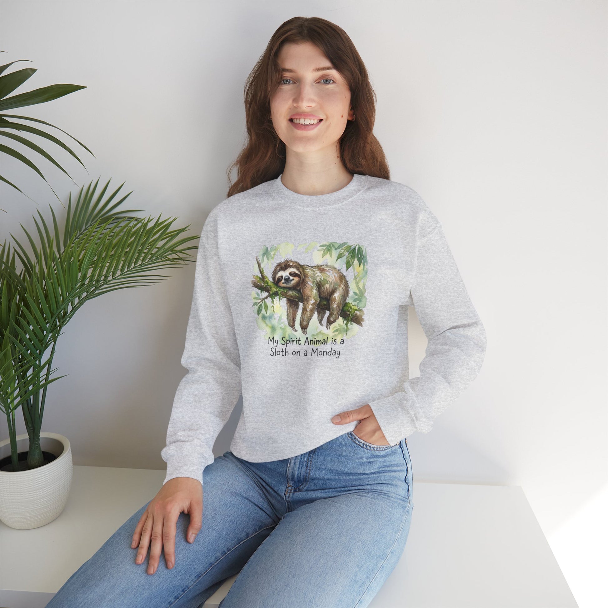 Gray sweatshirt with sloth and "My Spirit Animal is a Sloth on a Monday" text.