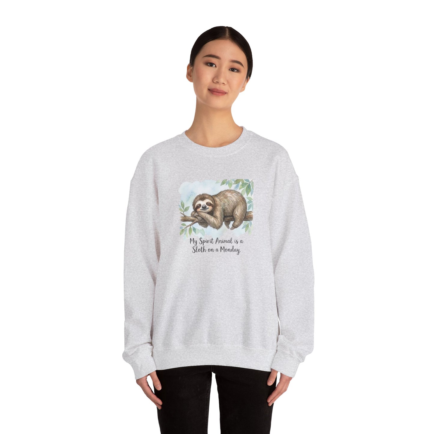 Light gray sweatshirt with watercolor sloth on a branch, text reads "My Spirit Animal is a Sloth on a Monday".