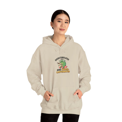 Beige hoodie with a graphic of a frog holding a coffee cup, labeled "Overstimulated and Under-Caffeinated."