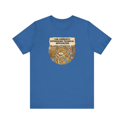 Blue t-shirt with a grumpy cat wrapped in a blanket saying "I AM CURRENTLY EXPERIENCING TECHNICAL DIFFICULTIES".
