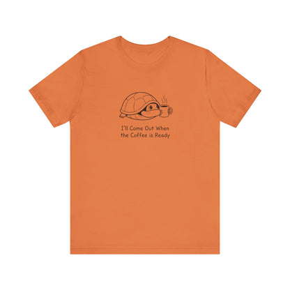Orange t-shirt with turtle wearing a coffee mug and text "I'll Come Out When the Coffee is Ready".