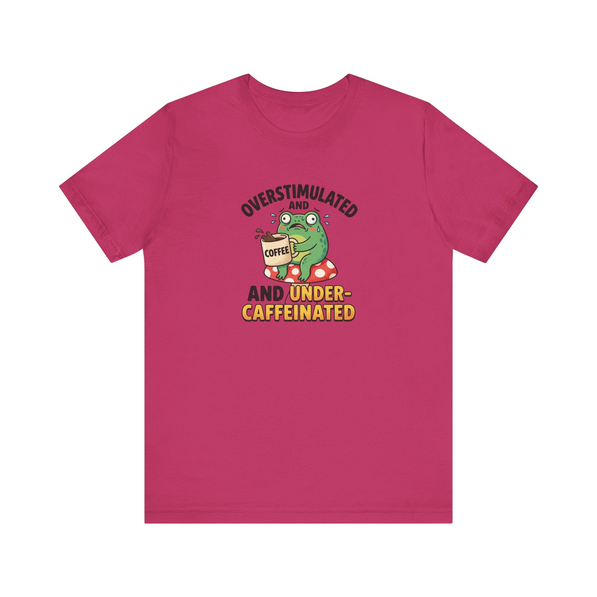 Frog with coffee cup on mushroom, text reads "Overstimulated and Under-Caffeinated".