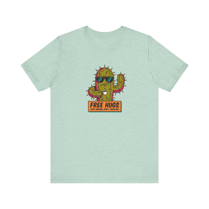 Cartoon cactus wearing sunglasses, saying "FREE HUGS (JUST KIDDING, DON'T TOUCH ME!)".