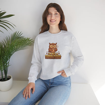Grey crewneck sweatshirt with cartoon owl holding coffee mug and text.